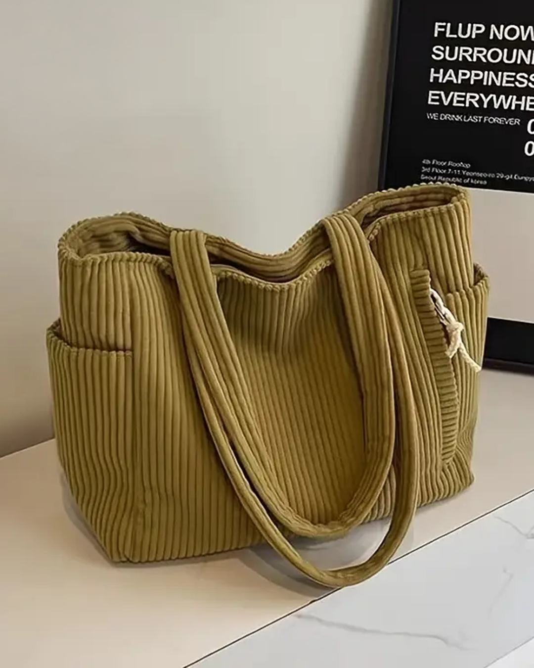 Ava – Ribbed shoulder bag with drawstring detail